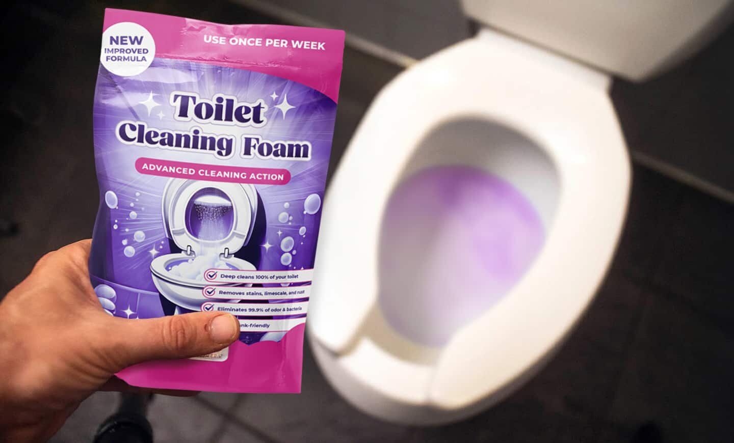 Hand holding FizzClean Toilet Cleaning Foam packet over a toilet with purple foam